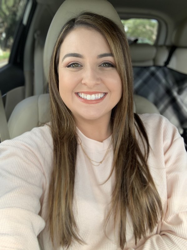 A client showing off fresh balayage color